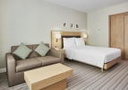 Кровать или кровати в номере Hilton Garden Inn Dubai Mall Of The Emirates