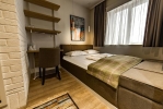 Кровать или кровати в номере Belgrade Inn Garni Hotel 