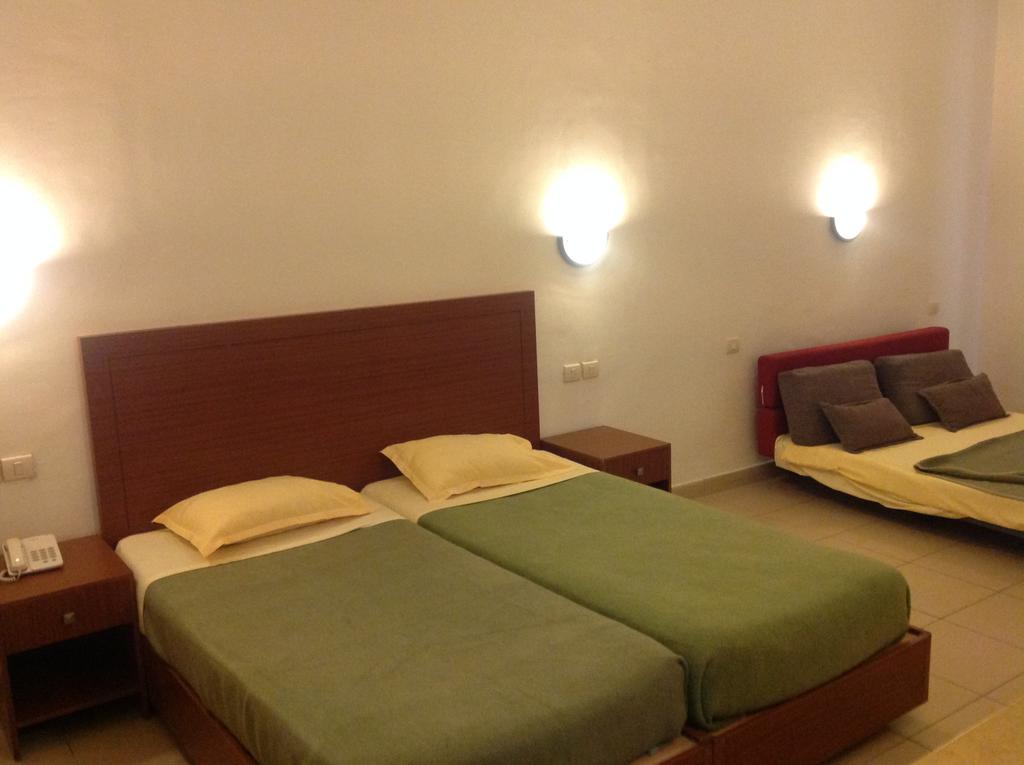 Отель Кровать или кровати в номере Dar Khayam 