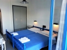 Кровать или кровати в номере Hotel Iro
