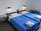 Кровать или кровати в номере Hotel Iro