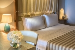 Кровать или кровати в номере Chia Laguna - Hotel Laguna