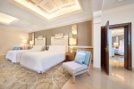 Кровать или кровати в номере Waldorf Astoria Ras Al Khaimah