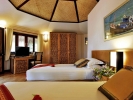 Кровать или кровати в номере Bamboo Village Beach Resort & Spa