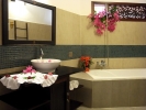 Ванная комната в Bamboo Village Beach Resort & Spa