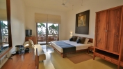 Кровать или кровати в номере Pandanus Beach Resort & Spa