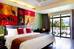 Кровать или кровати в номере Centara Ceysands Resort & Spa Sri Lanka