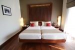 Кровать или кровати в номере Eden Resort & Spa