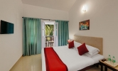 Кровать или кровати в номере Santiago Beach Resort