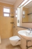 Ванная комната в Palmarinha Resort & Suites