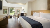 Кровать или кровати в номере Holiday Inn Resort Baruna Bali