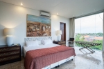 Кровать или кровати в номере Bali Mystique Hotel & Apartment