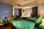 Кровать или кровати в номере Swiss-Belhotel Petitenget