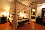 Кровать или кровати в номере Puri Saron Hotel Seminyak