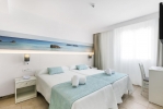 Кровать или кровати в номере Aparthotel Roc Continental Park 