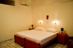 Кровать или кровати в номере Hotel Thai Lanka