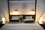 Кровать или кровати в номере Hotel Thai Lanka