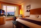 Кровать или кровати в номере Wan Jia Hotel Resort Sanya