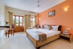 Кровать или кровати в номере The Fern Spazio Leisure Resort, Anjuna Goa
