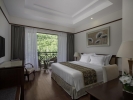 Кровать или кровати в номере Vinpearl Resort Nha Trang