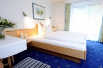 Кровать или кровати в номере Hotel Garni Valülla