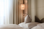 Кровать или кровати в номере Hotel Trofana Alpin