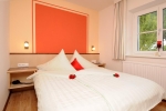 Кровать или кровати в номере Appartements Fliana Mathon/Ischgl 