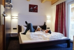 Кровать или кровати в номере Astellina hotel-apart