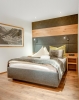 Кровать или кровати в номере Hotel Albona