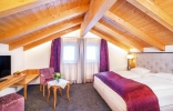 Кровать или кровати в номере Hotel Seespitz