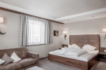Кровать или кровати в номере Hotel Garni Caroline
