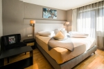 Кровать или кровати в номере Hotel Gipfelherz Ischgl