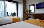 Кровать или кровати в номере Unique Mui Ne Resort and Spa