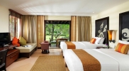 Кровать или кровати в номере Mövenpick Resort & Spa Karon Beach Phuket
