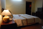 Кровать или кровати в номере Tien Dat Resort
