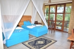 Кровать или кровати в номере Sunset Kendwa Beach Hotel