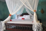 Кровать или кровати в номере Coral Reef Resort