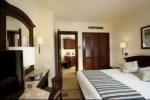Кровать или кровати в номере Hurghada Coral Beach Hotel