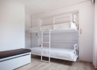 Двухъярусная кровать или двухъярусные кровати в номере Catalonia Las Vegas