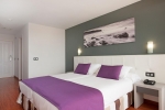 Кровать или кровати в номере Olé Tropical Tenerife