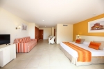 Кровать или кровати в номере Sunlight Bahia Principe Tenerife