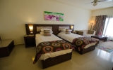 Кровать или кровати в номере Lotus Bay Resort