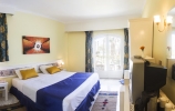 Кровать или кровати в номере Lotus Bay Resort