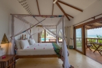 Кровать или кровати в номере Warere Beach
