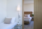 Кровать или кровати в номере Kriti Beach Hotel