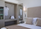 Кровать или кровати в номере Kriti Beach Hotel