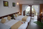 Кровать или кровати в номере Canary Beach Resort