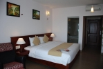 Кровать или кровати в номере Canary Beach Resort