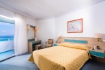 Кровать или кровати в номере Pallini Beach