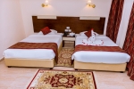 Кровать или кровати в номере Golden Beach Resort